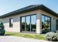 Modern home exterior showcasing the seamless synergy between integrated home remodeling and a premium new roof
